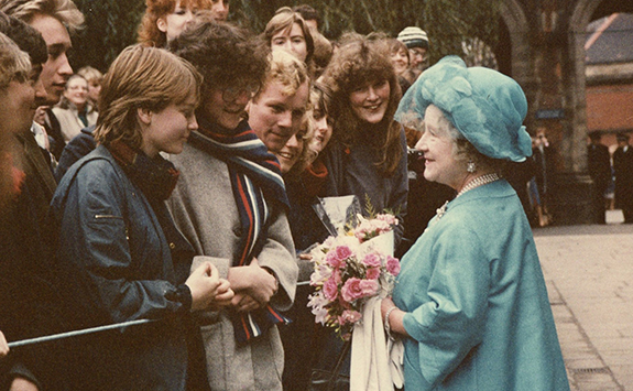 Queen Mother in the Quadrangle greeting students